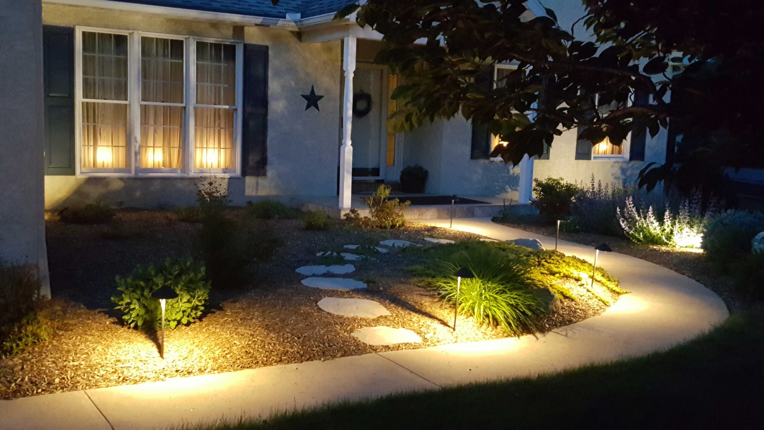 Illuminating Your Landscape: Landscape Lighting and Lawn Care